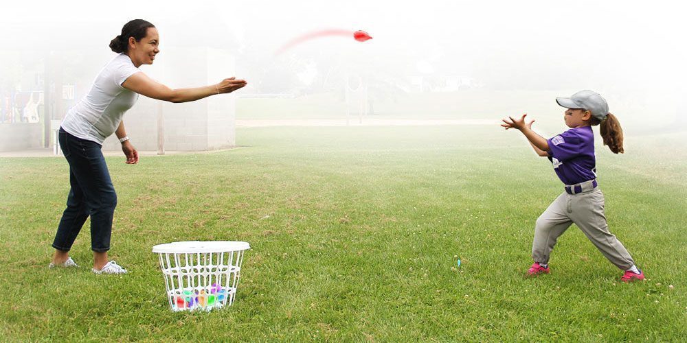 waterballoon toss mother and daughter